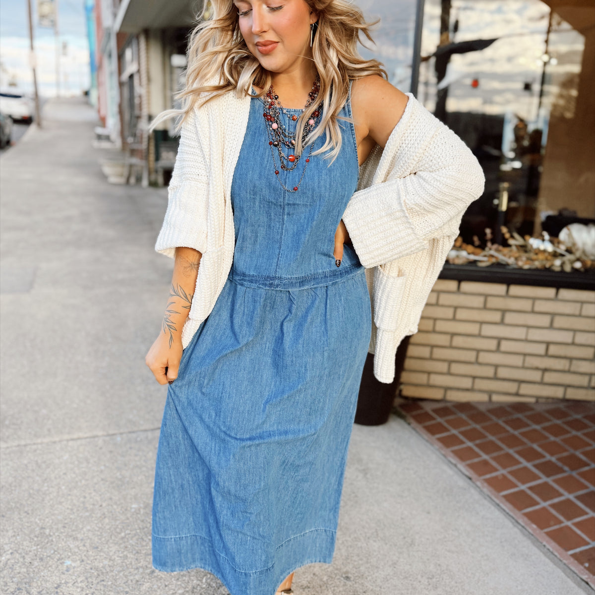 sweater over denim dress HOW TO STYLE SWEATER DRESSES WITH JEANS