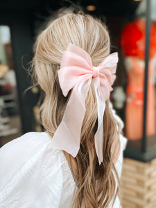 Next to you pink bow barrette