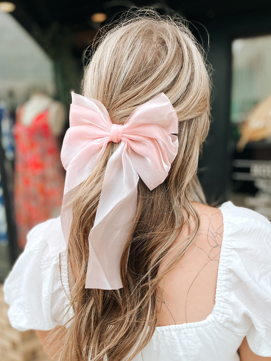 Next to you pink bow barrette