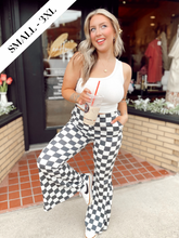 Load image into Gallery viewer, Walk it like it’s hot checkered flare pants