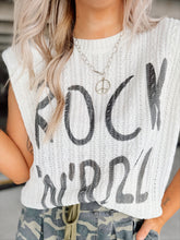 Load image into Gallery viewer, Person wearing a sleeveless white top with &#39;Rock N&#39; Roll&#39; text and camouflage pants and peace sign necklace.