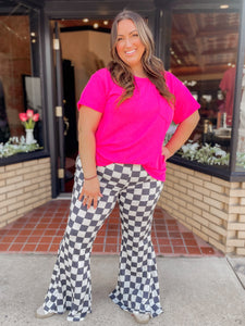 Walk it like it’s hot checkered flare pants