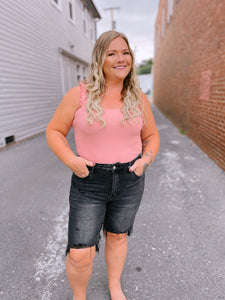 Super stretch black distressed Bermuda shorts