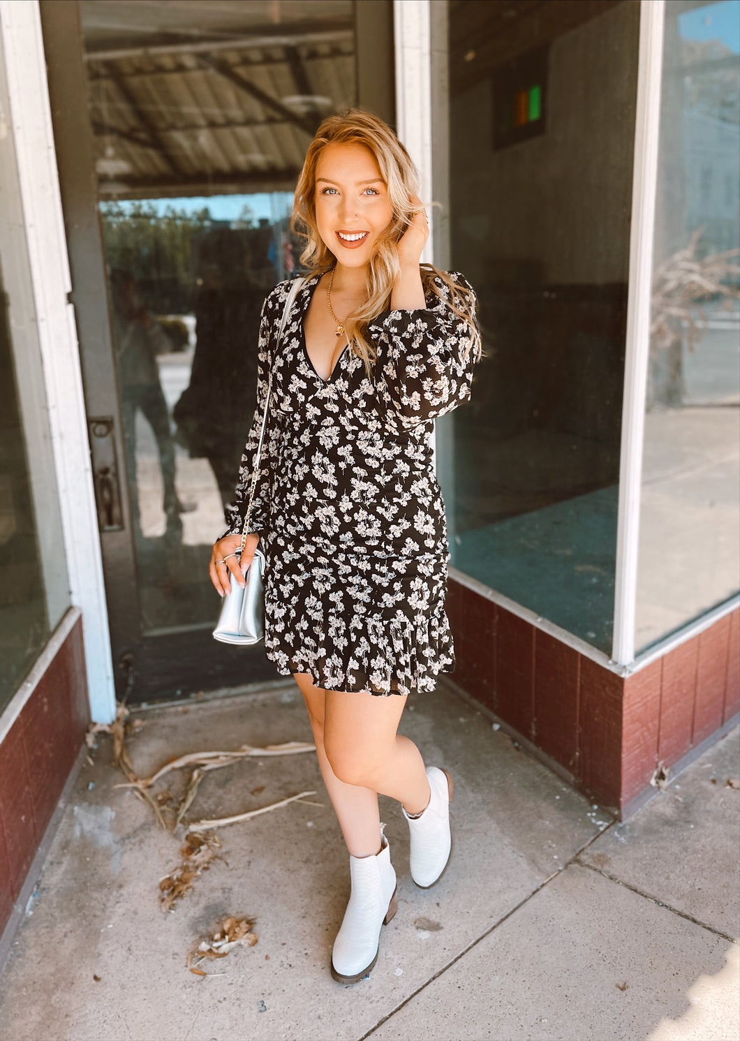 Picture perfect floral mini dress in Black