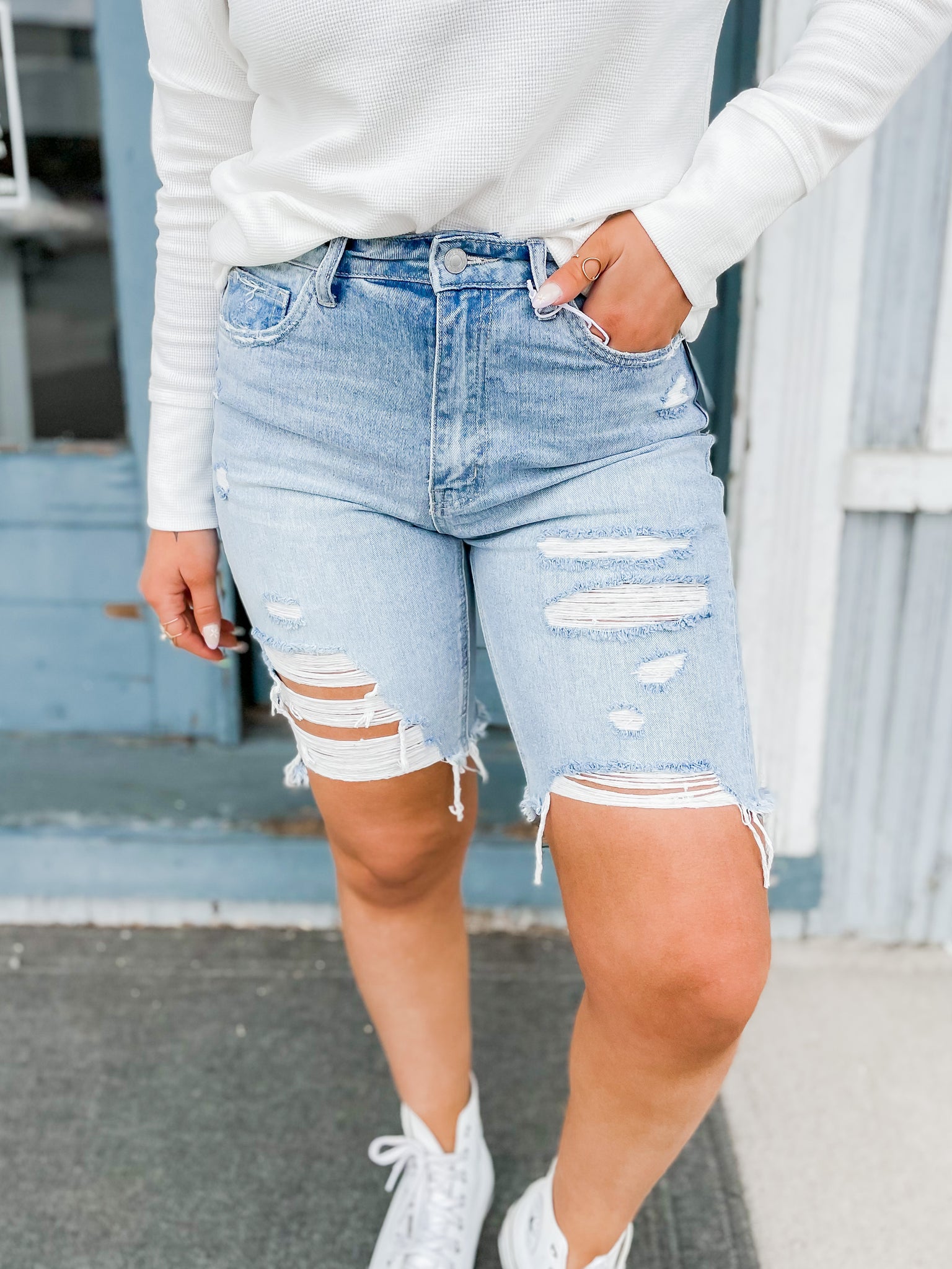 White fashion distressed bermuda shorts