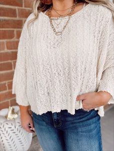 Whipped up cream sweater