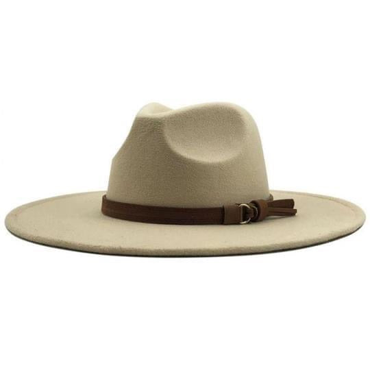 The Bethie Belted Wool Panama Hat features a beige wide-brim with a brown leather band and buckle, shown against a white background.